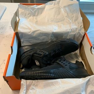Never worn, still in the box, all black Nike Free Metcon
